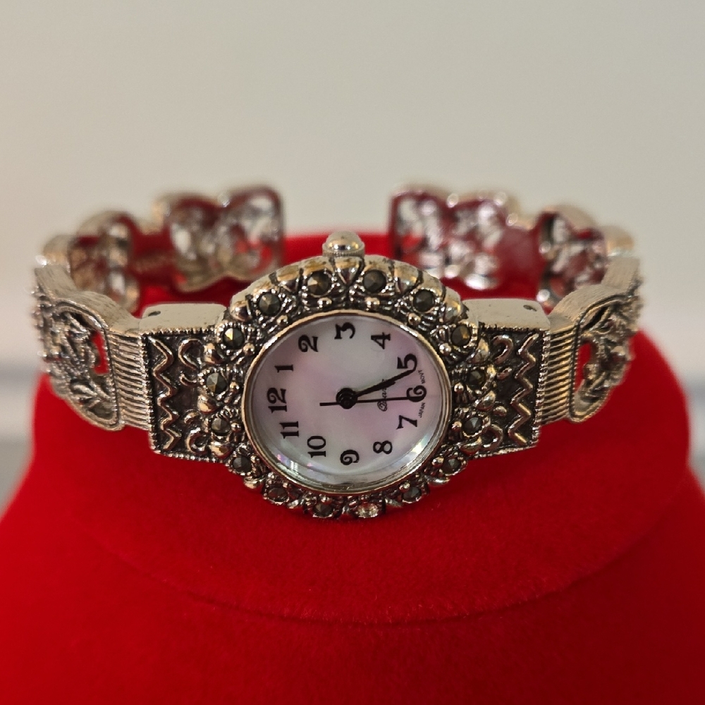 Intricate Silver Women's Watch with Floral Accents